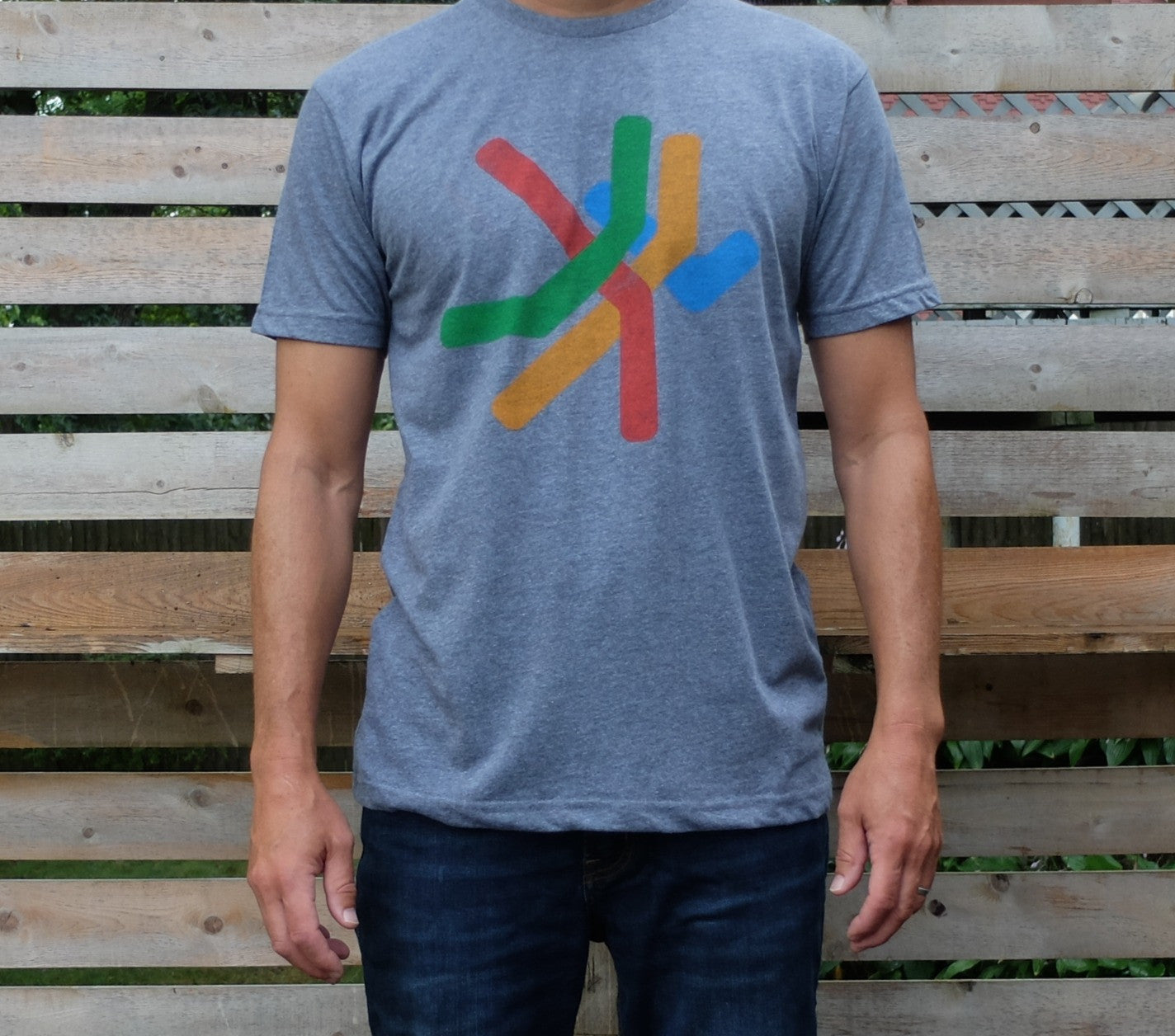 Man wearing heather grey simplified Boston MBTA Map T-shirt